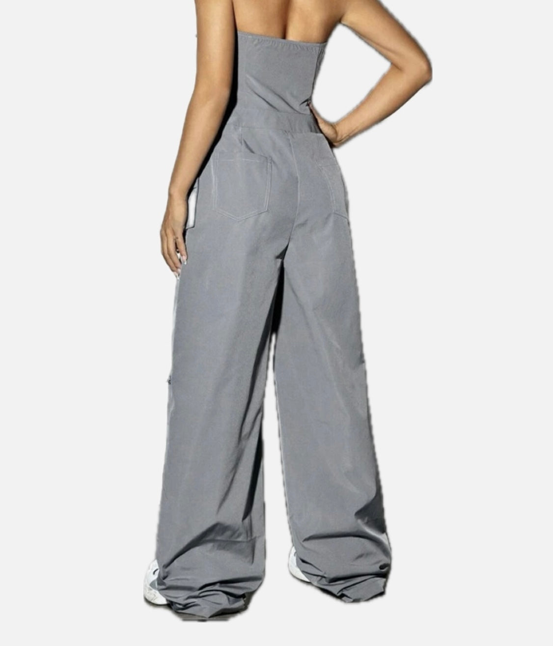 Cargo jumpsuit with pockets and zipper on the strapless sides